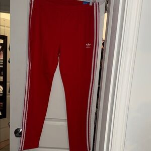 Adidas Red Joggers with White Stripes. Unisex